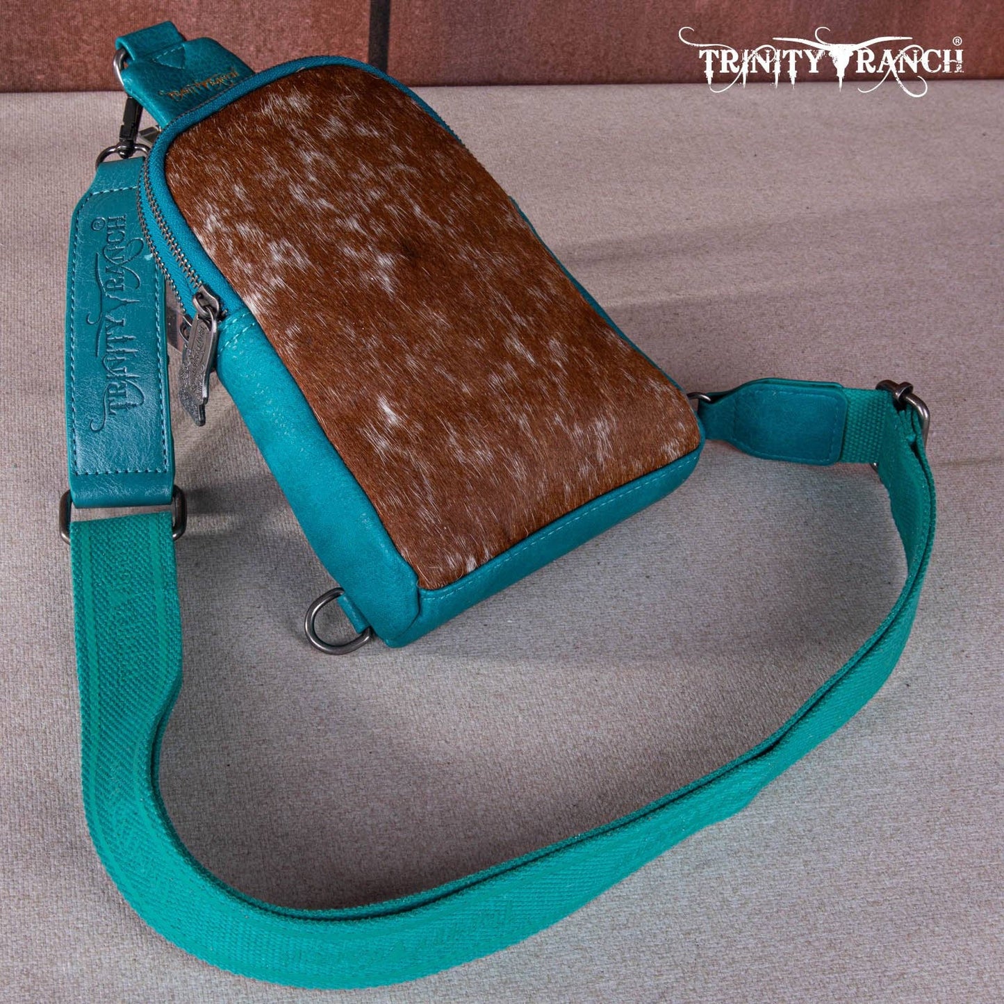 TR159-210 Trinity Ranch Genuine Hair-On Cowhide Collection Sling Bag