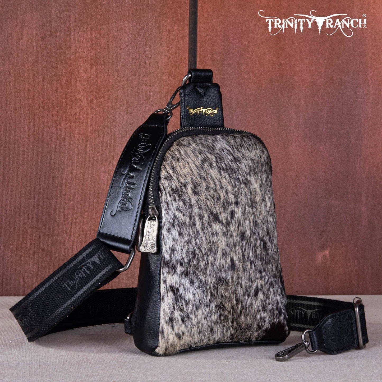 TR159-210 Trinity Ranch Genuine Hair-On Cowhide Collection Sling Bag