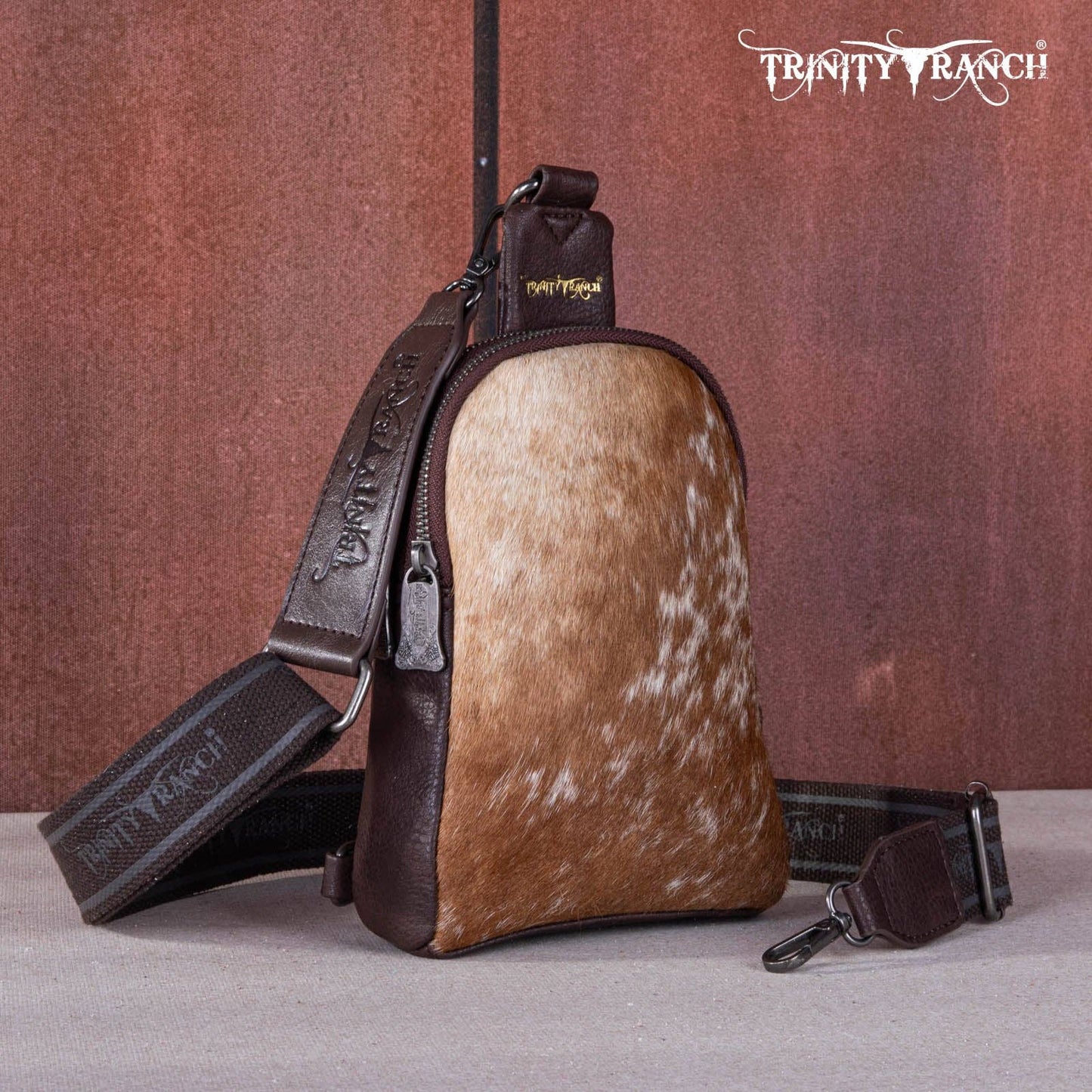 TR159-210 Trinity Ranch Genuine Hair-On Cowhide Collection Sling Bag