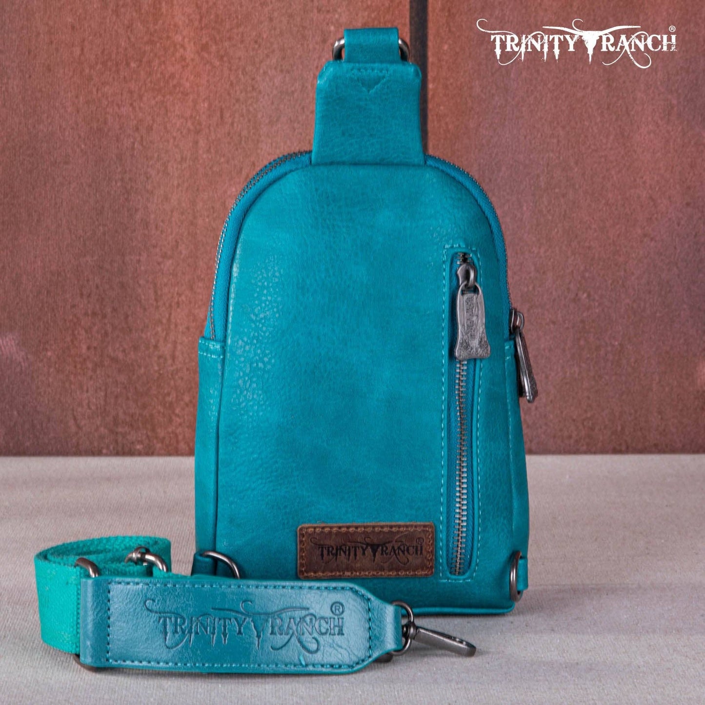 TR159-210 Trinity Ranch Genuine Hair-On Cowhide Collection Sling Bag