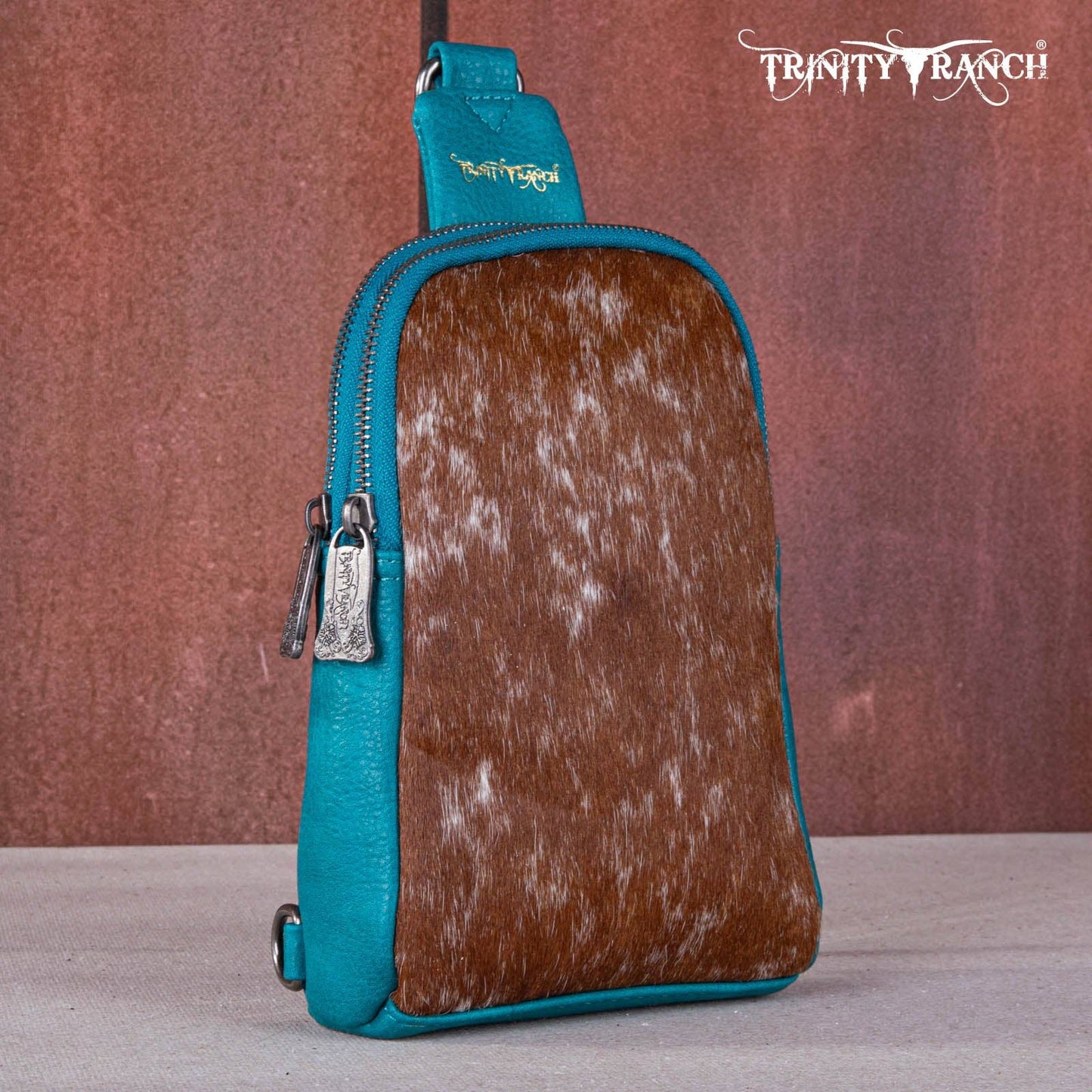 TR159-210 Trinity Ranch Genuine Hair-On Cowhide Collection Sling Bag