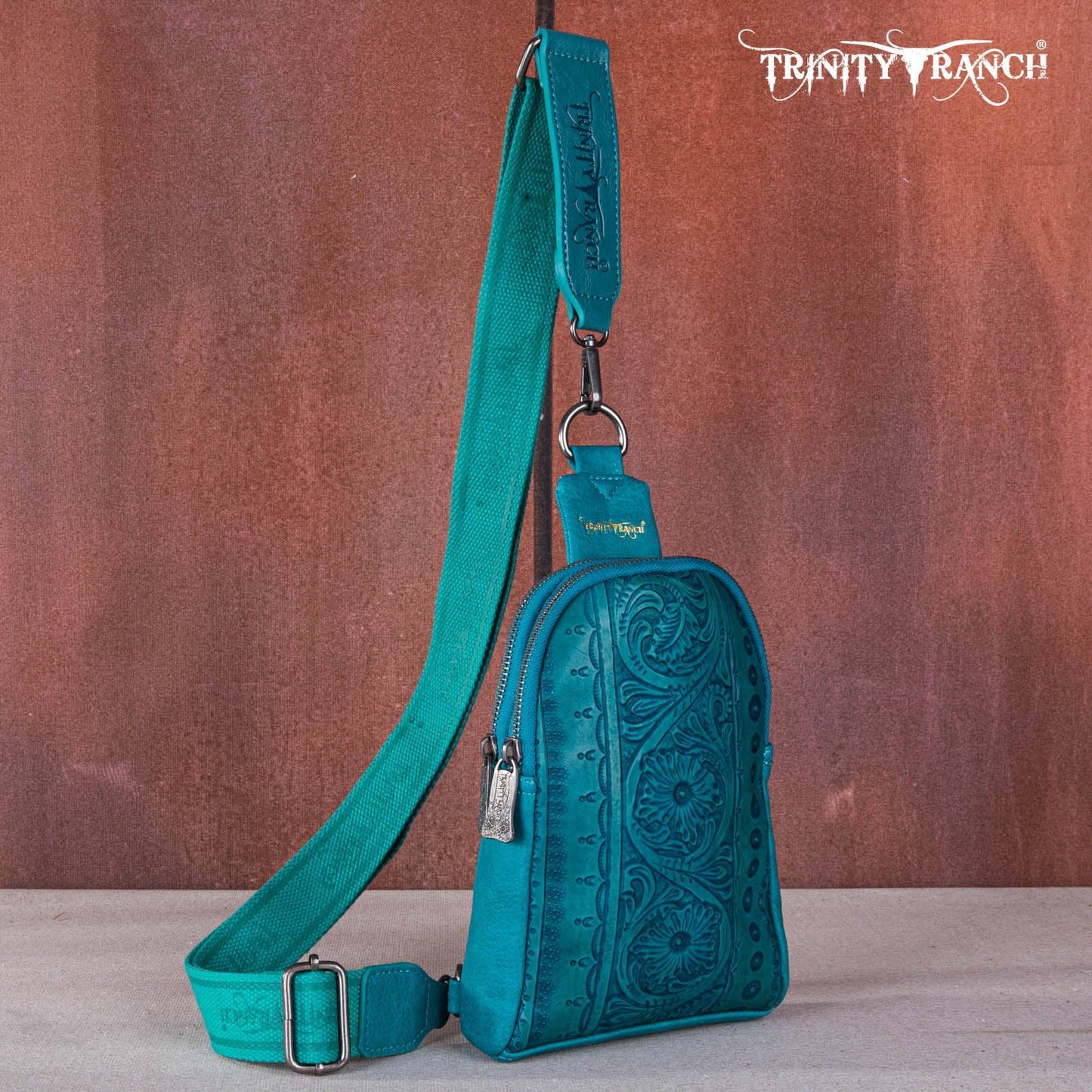 TR159-210A Trinity Ranch Floral Tooled  Collection Sling Bag